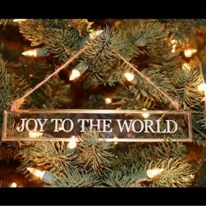 TWO STENCILED GLASS CHRISTMAS GREETINGS FRAMED IN BRASS